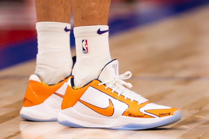 Phoenix Suns guard Devin Booker wears Nike Kobe 5 Protro shoes.